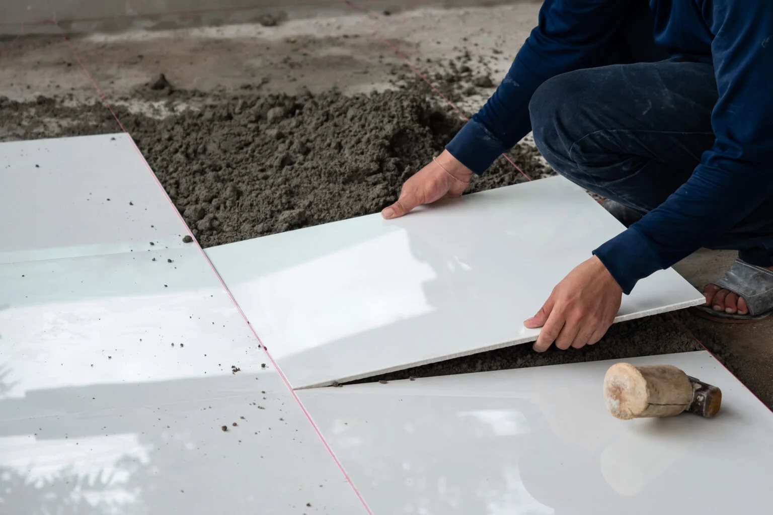 high-angle-view-man-holding-paper-while-standing-table